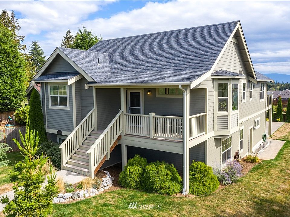 West facing front with covered deck