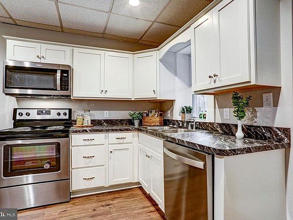 Kitchen, Electric stove and microwave, dishwasher, double sink