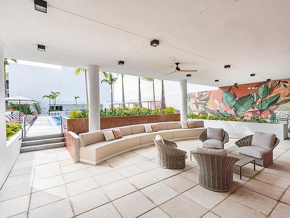 Lounge in comfort with cabanas by the pool, your oasis of relaxation.