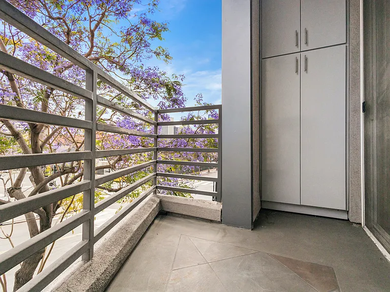 Balcony off Bedroom 2 with Outdoor Floor to Ceiling Storage