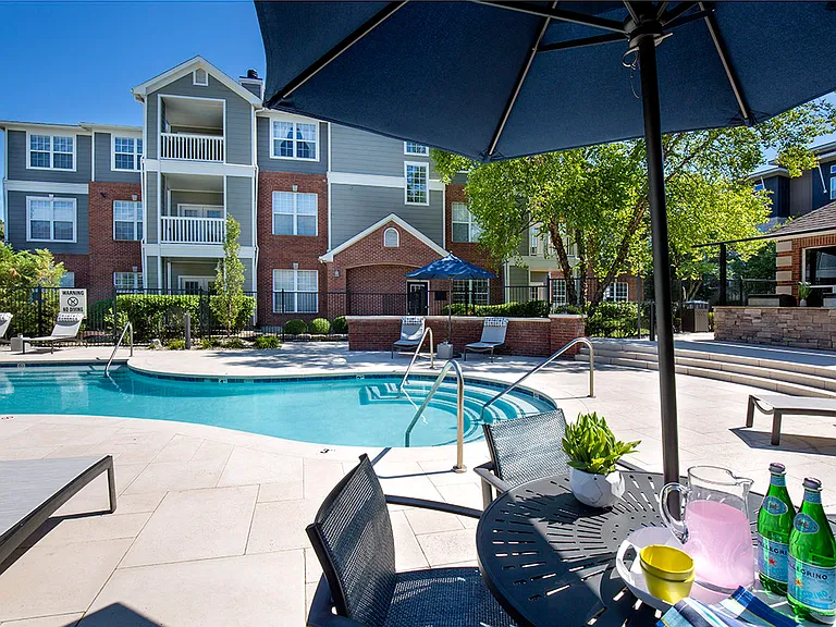Resort-style pool and dining area