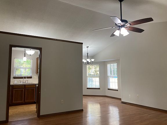View of dining nook and kitchen from living room