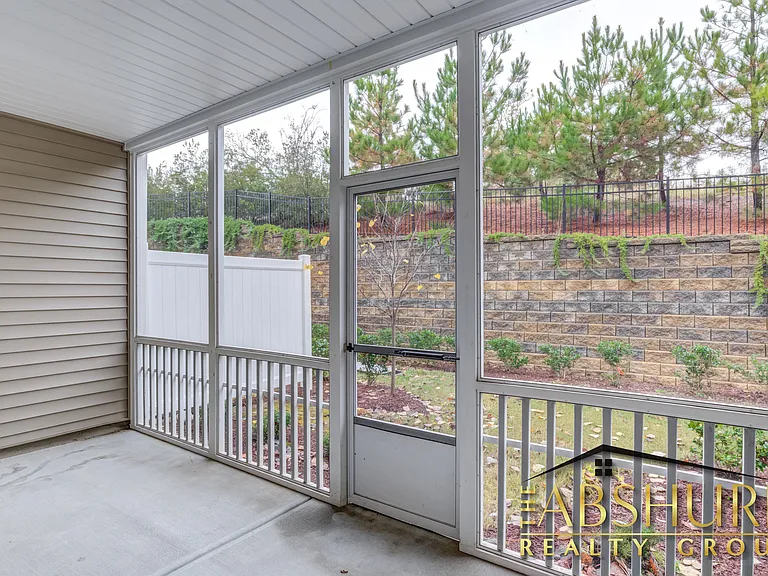 Private screened in patio with storage closet