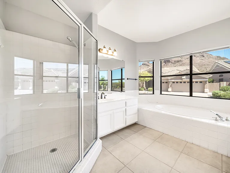 Separate large shower in master bathroom.