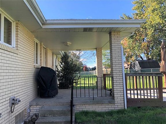 Covered back porch. Entertain during fall, summer and spring using the wonderful covered porch.