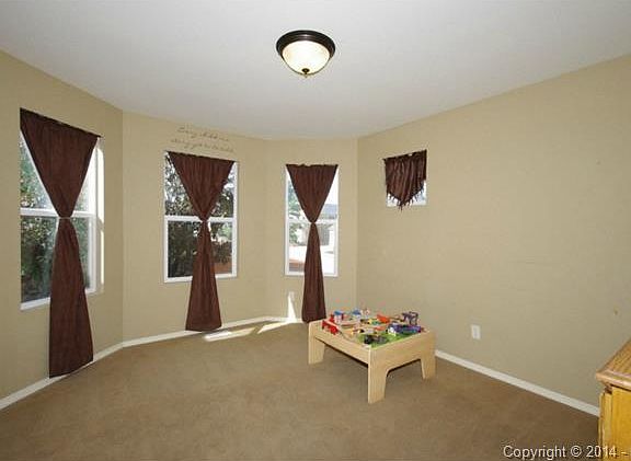 Main level room used as child's play area