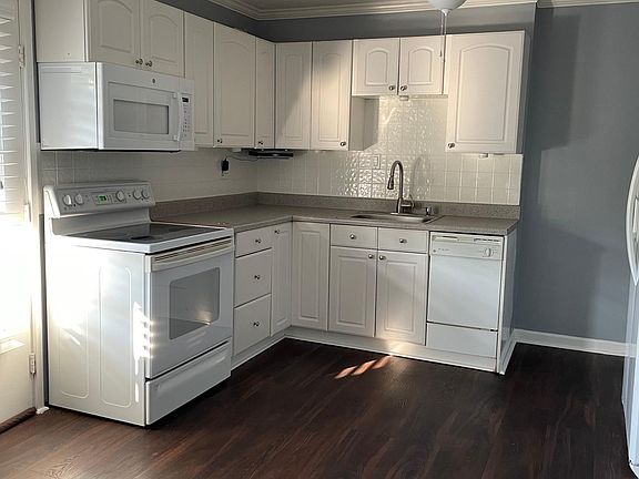 White painted cabinet in kitchen