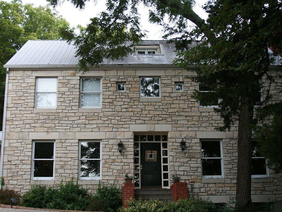 Limestone with metal roof