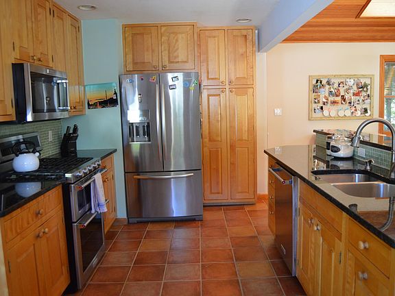 Updated appliances. Gas stove. Upgraded, soft-close cabinets. Large pantry.