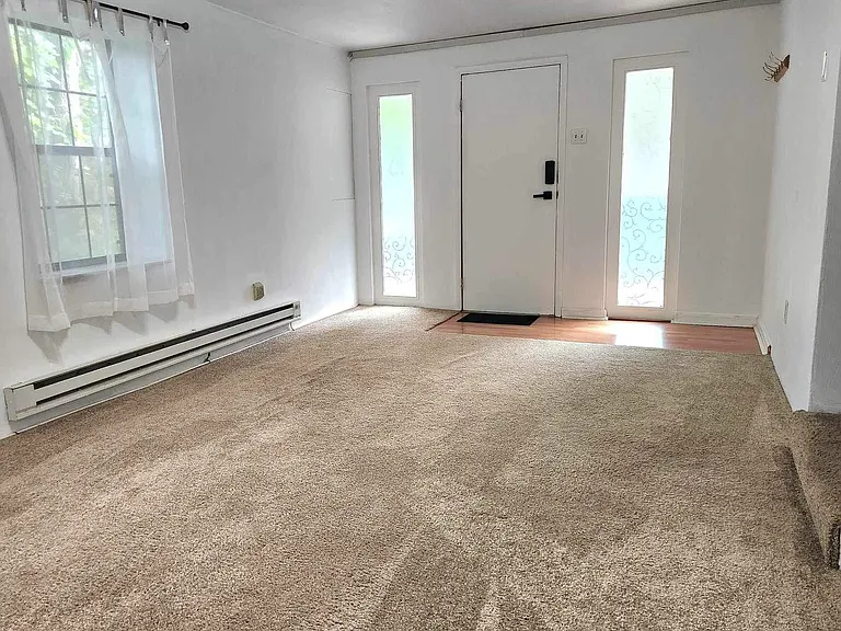 Unit 1 - Living room & front door