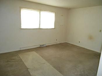 Living room has 2 large windows for lots of light.