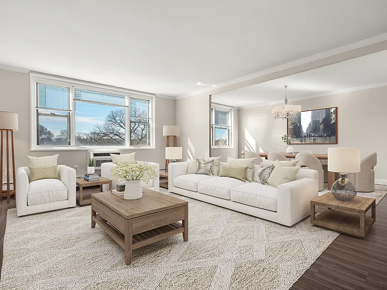 Inviting open-concept living and dining area with elegant decor, featuring large windows, plush seating, and abundant natural light at Parkside Place, apartments in Cambridge, MA