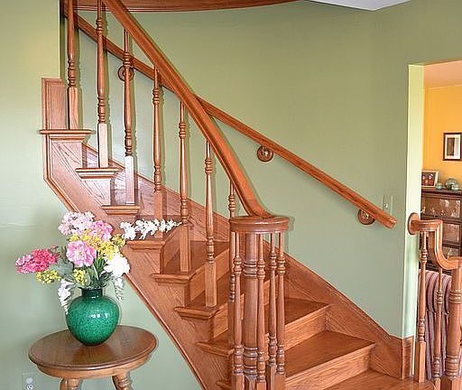 Oak staircase in foyer