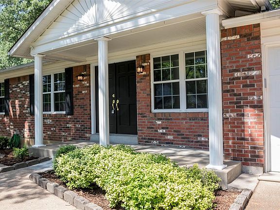 Impressive curb appeal, mostly brick