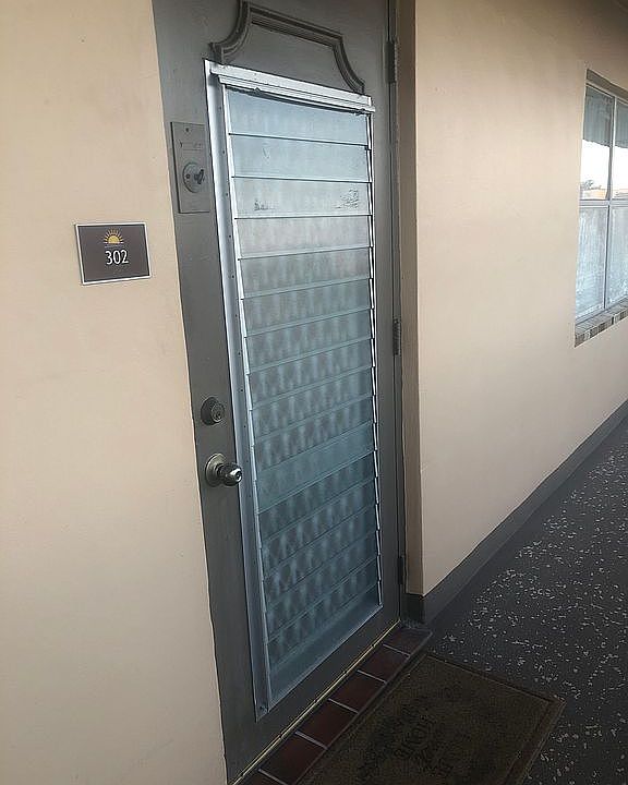 Jalousie windowed door
