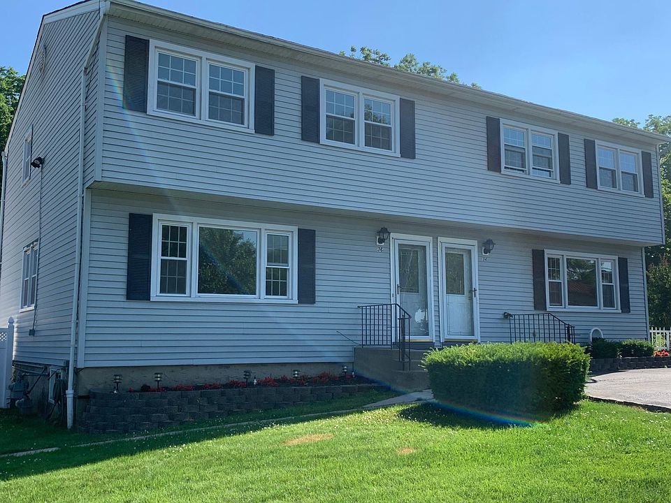 front of house. Unit 34 is on the right.