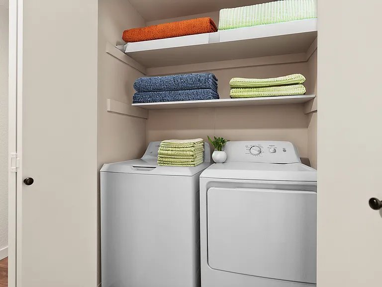 Maximize space with this well-organized laundry nook. Maximize space with this well-organized laundry nook.