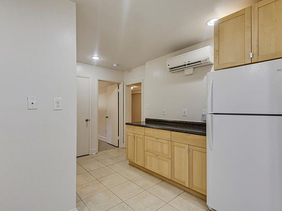 Large refrigerator with freezer. Separate zone for heating/cooling.