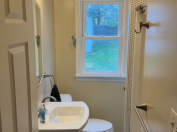 Bathroom, including medicine cabinet and two linen closets for storage