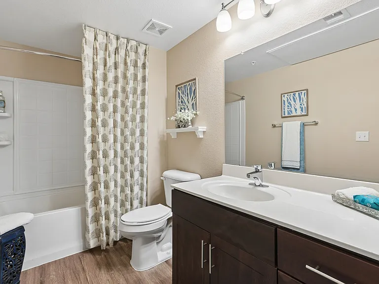 Explore the inviting bathroom at Highland Groves at Morrison Ranch, featuring sleek finishes and modern fixtures. Enjoy a comfortable and stylish living space designed for your needs. Schedule your visit today and see the difference!