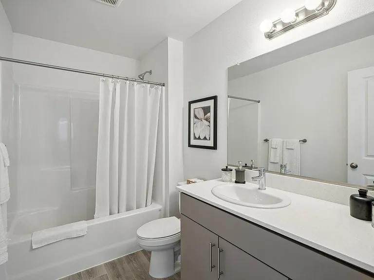 Tub-shower combo and walk-in showers available.