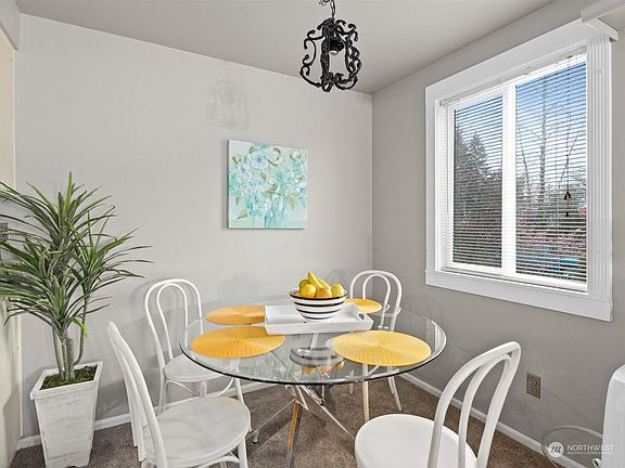 A dedicated dining area with natural light.>