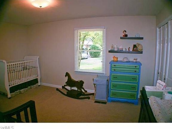 The expansive bedroom offers great light and space.