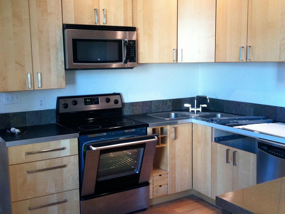 Kitchen with stainless steel appliances Electric stove