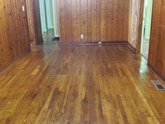 Family room with original hardwood floors.