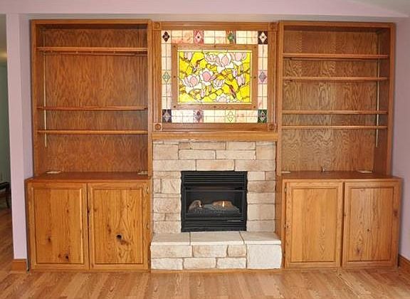 Fireplace with bookshelves