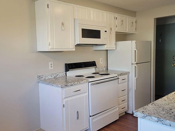 Kitchen includes: Stove, fridge, dishwasher and microwave