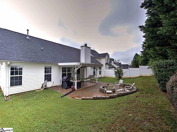 Fenced in Backyard with Firepit