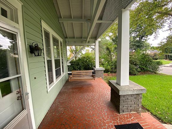 Covered front porch with swing