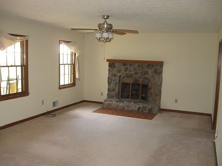 Large family room with Stone gas fireplace