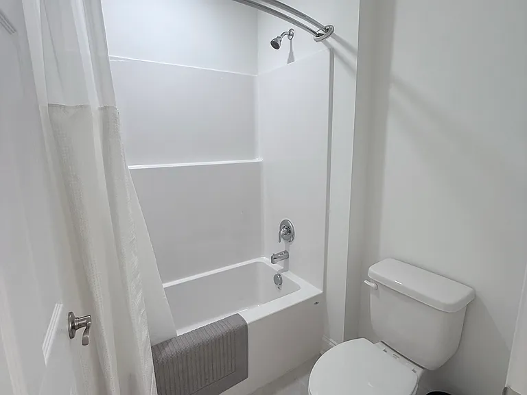 2nd level hallway bathroom with separate sink/vanity area.