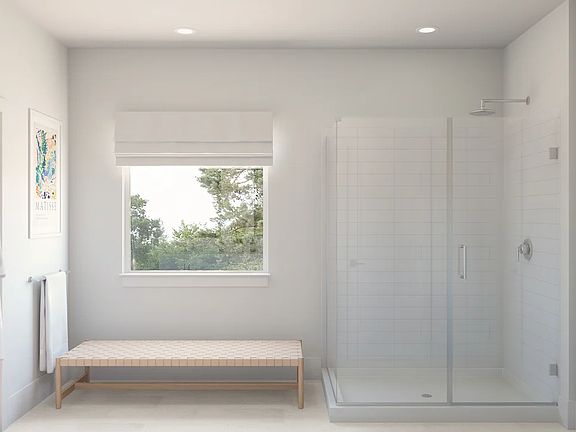 Primary bath with glass shower enclosure