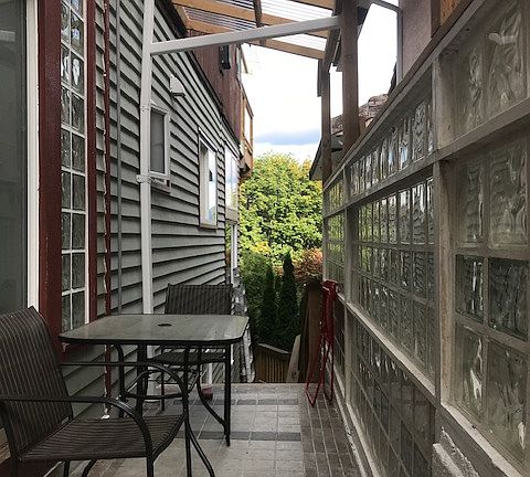 Suite Patio with view of Garden and Deep Cove