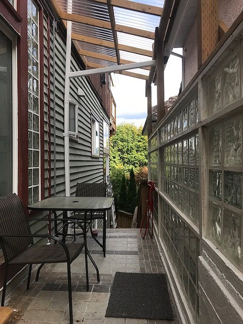 Suite Patio with view of Garden and Deep Cove