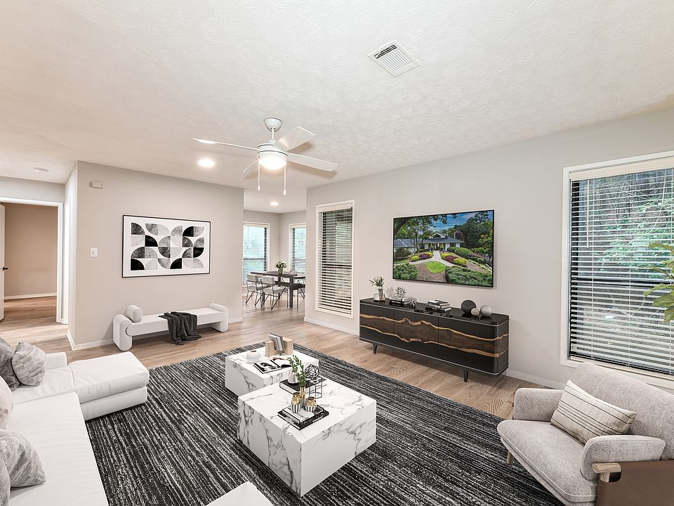 Spacious living room looking toward dining area
