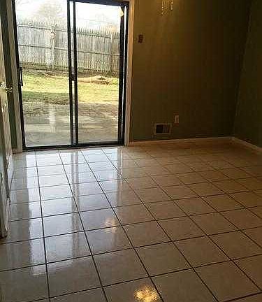 eating area in kitchen with sliders