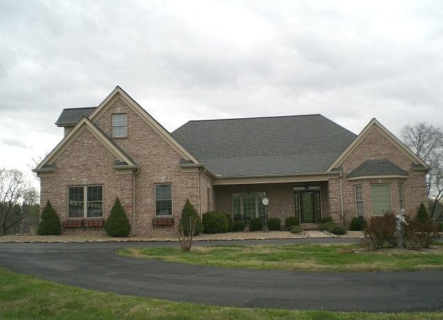 Front of house, circular driveway