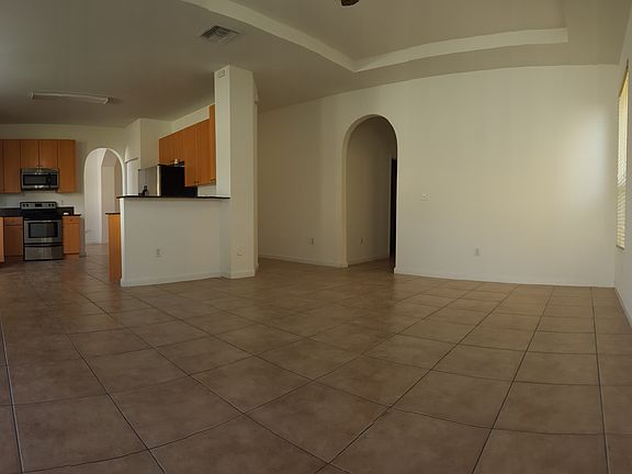 Tv room and kitchen