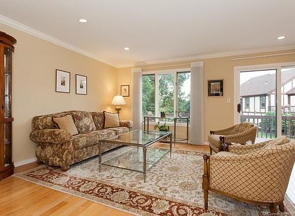 light filled LR with sliders to deck