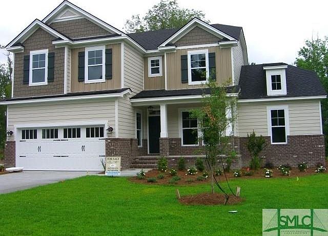 EXTERIOR FRONT WITH COVERED PORCH
