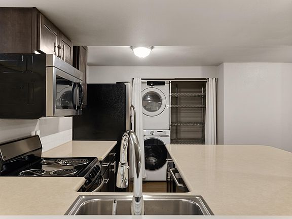 Kitchen and in-unit laundry closet