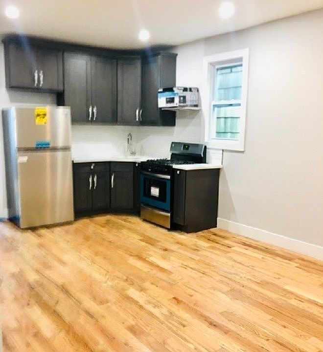 1st image of 1224 E 92nd St Floor 2