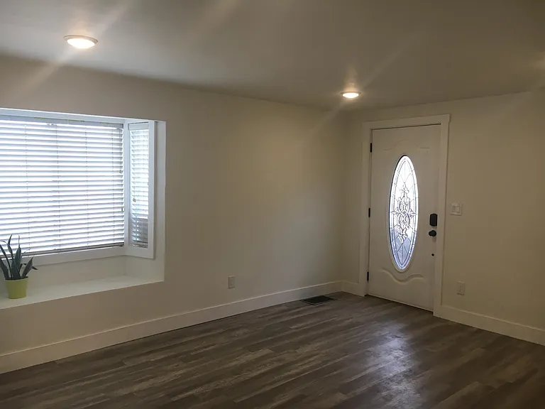 Living room and front door.