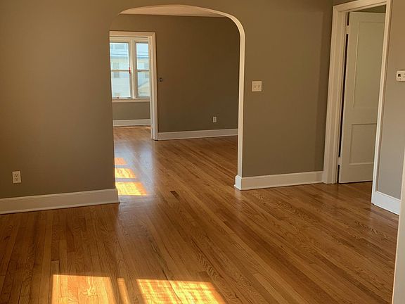 View from Kitchen Doorway of the Dining Room, Living Room and Sunroom.