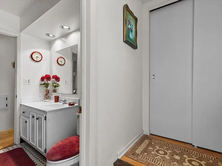 ON SUITE BEDROOM, ONE DOOR TO HALL ONE TO PRIMARY BEDROOM