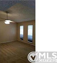 TWO LARGE LIVING ARES WITH CEILING FANS